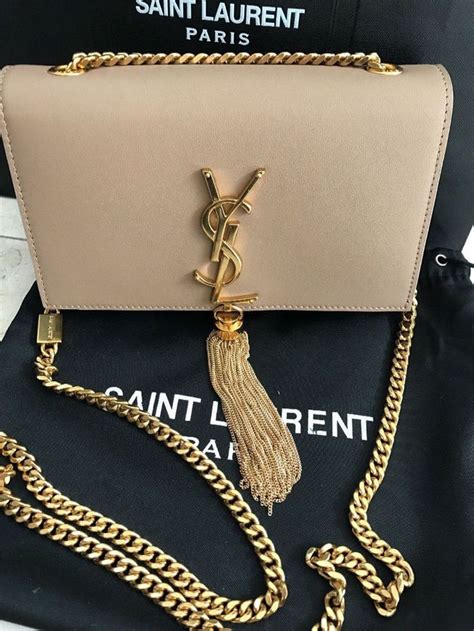 ysl white tassel bag